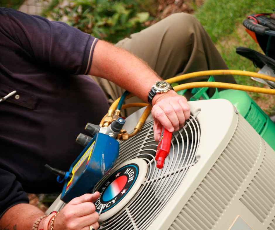 Maintenance check on an HVAC unit