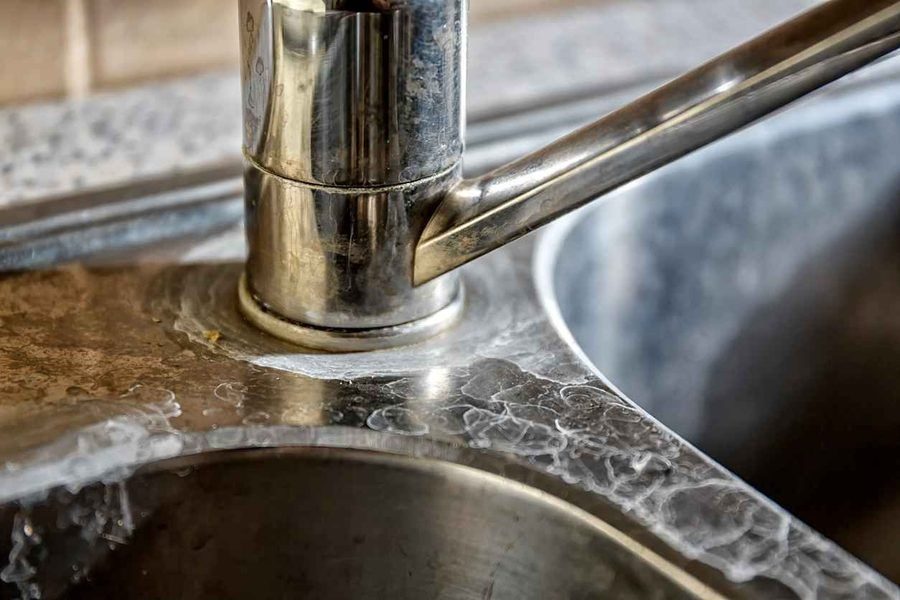 Hard water stains on kitchen sink